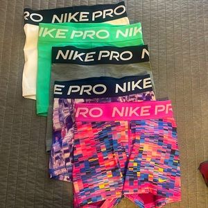 5 pair of women’s Nike Shorts, all size Small